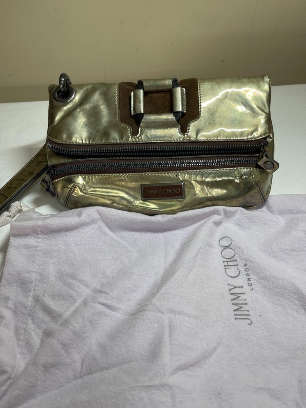 Jimmy Choo Metallic Gold Leather Wristlet with Buckle Detail authentic